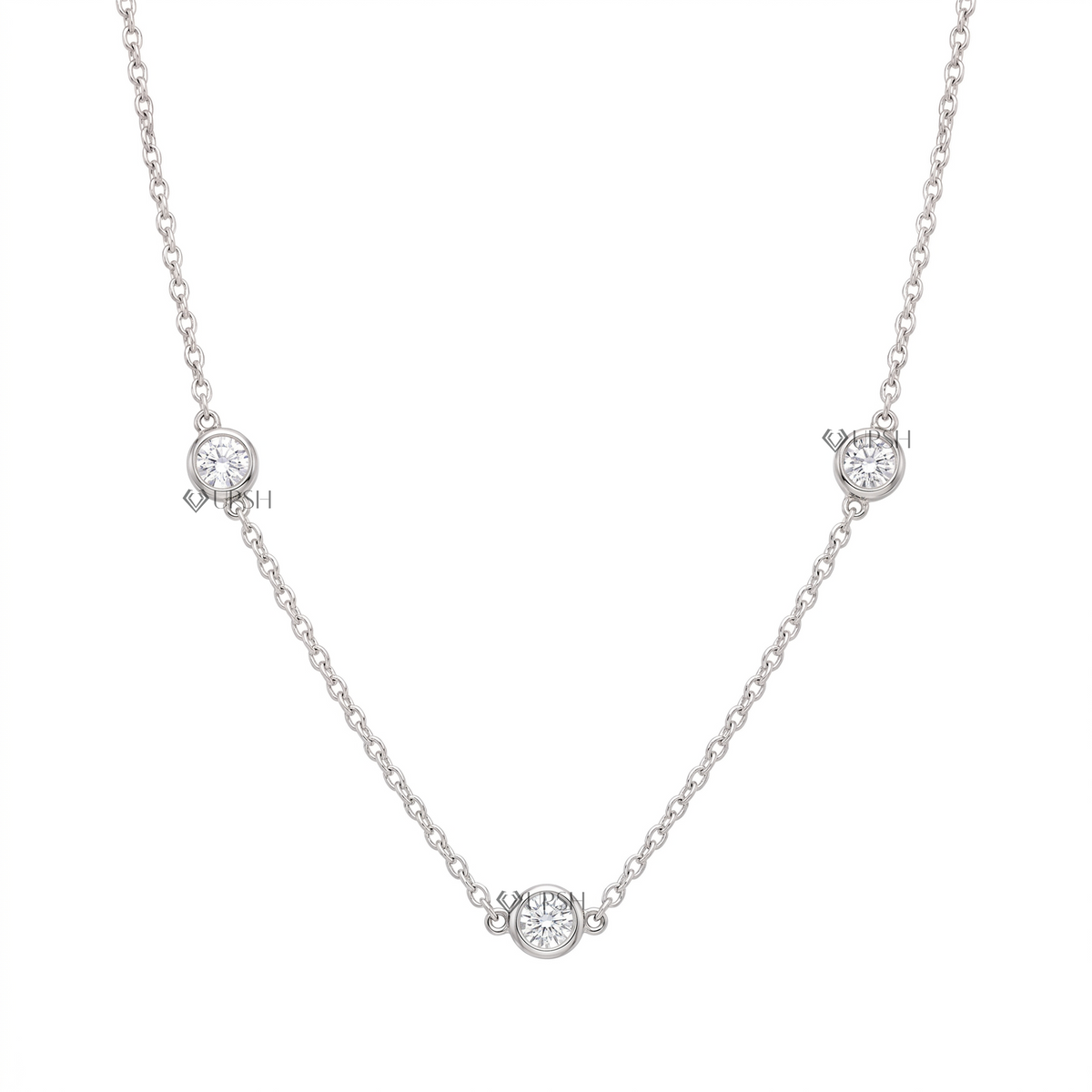 solid white gold three stone bezel set diamond station cable chain necklace displayed on clean white background