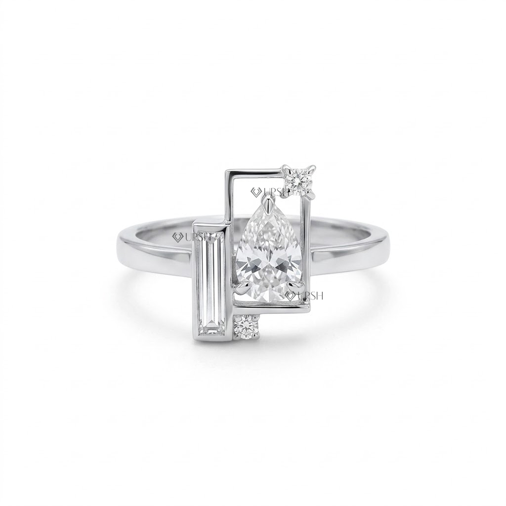Solid white gold asymmetrical geometric statement ring featuring pear cut, baguette, and round lab diamonds within an architectural rectangular frame