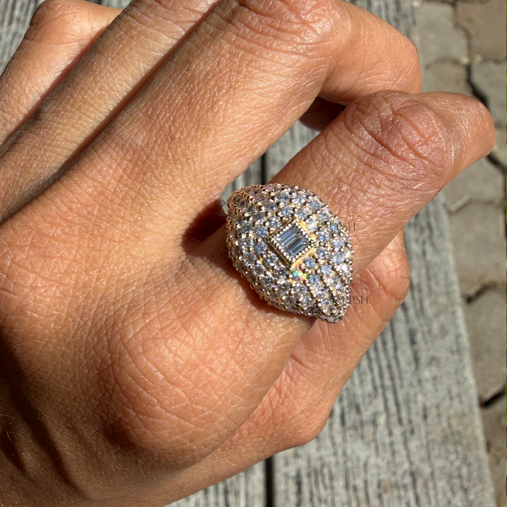 Detailed daylight view showing diamond fire and milgrain detail of chunky dome signet ring on finger