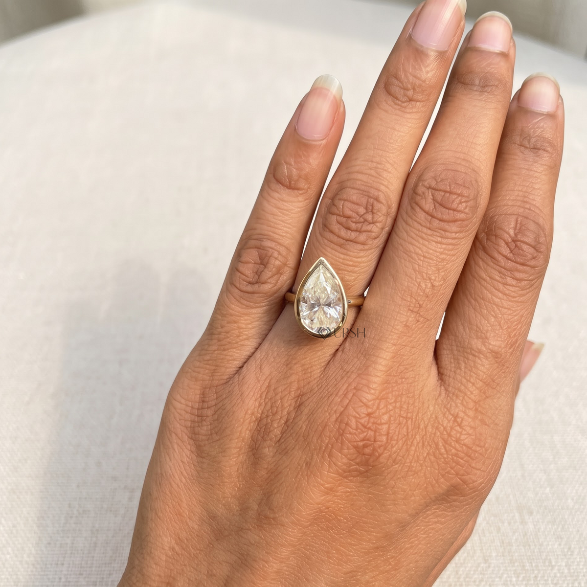 Pear Cut Diamond Bezel Set Engagement Ring