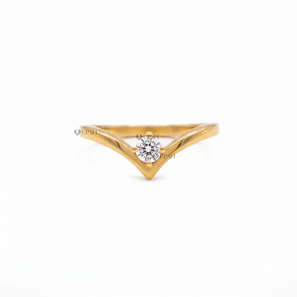 Solid yellow gold chevron wishbone wedding band featuring an asymmetrical prong set round lab diamond
