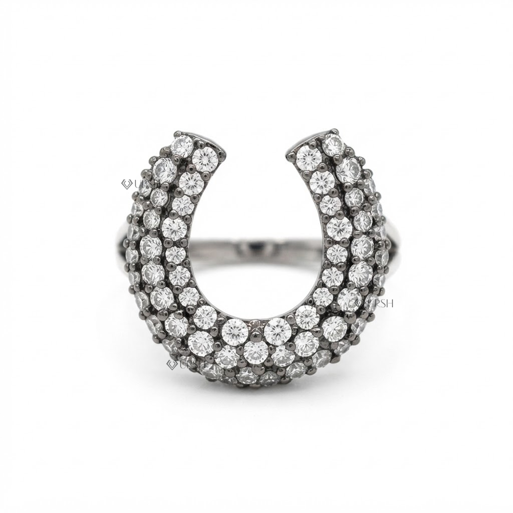 Solid white gold architectural horseshoe ring covered in brilliant round diamond pavé