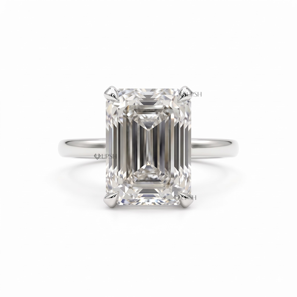 Solid white gold engagement ring featuring large elongated emerald cut lab grown diamond solitaire