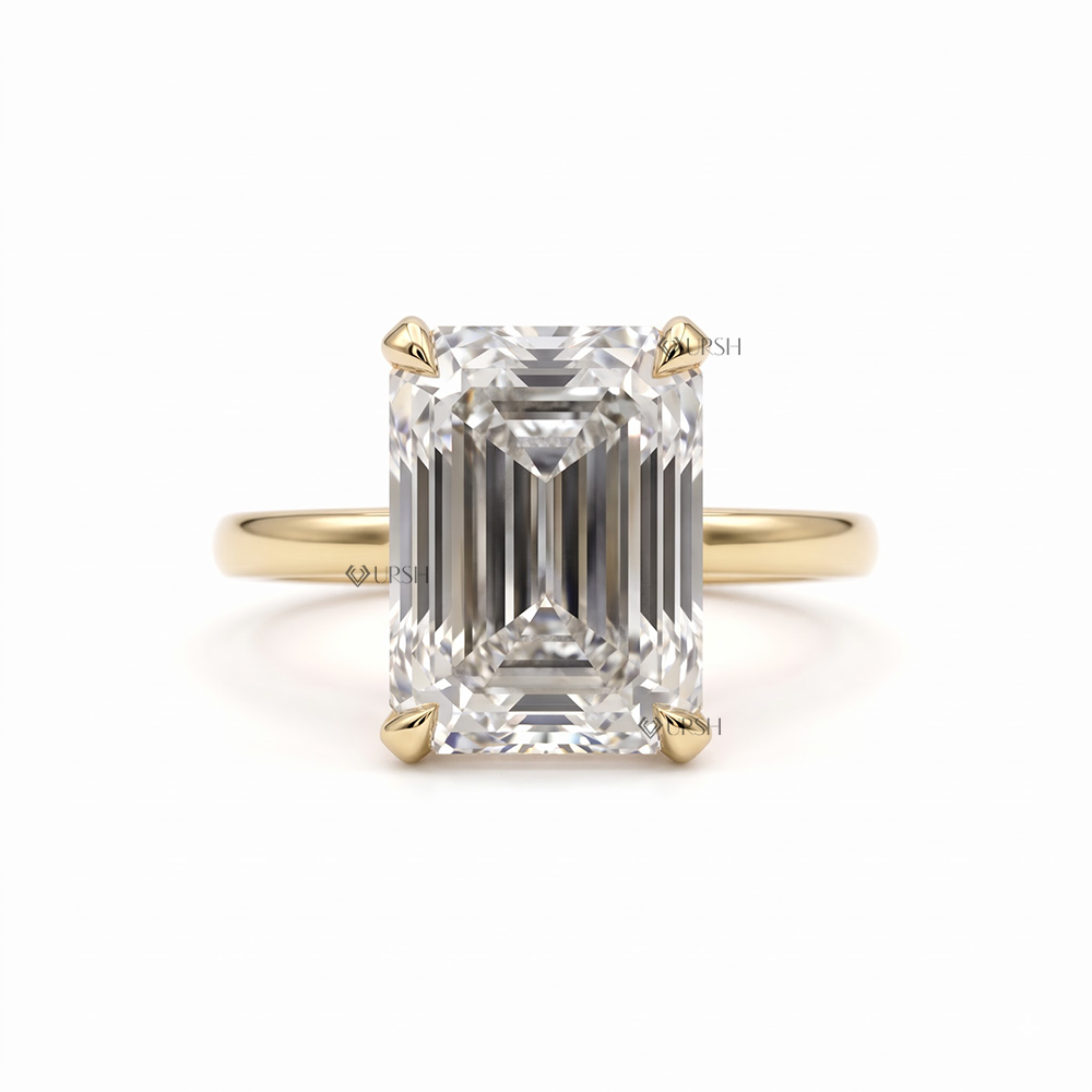 Solid yellow gold solitaire engagement ring set with step cut emerald lab diamond