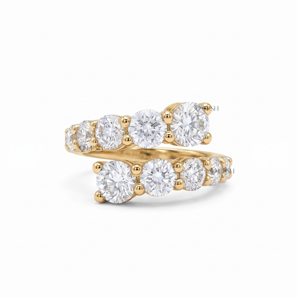 Solid yellow gold prong-set graduated bypass diamond statement ring featuring dual wrap rows