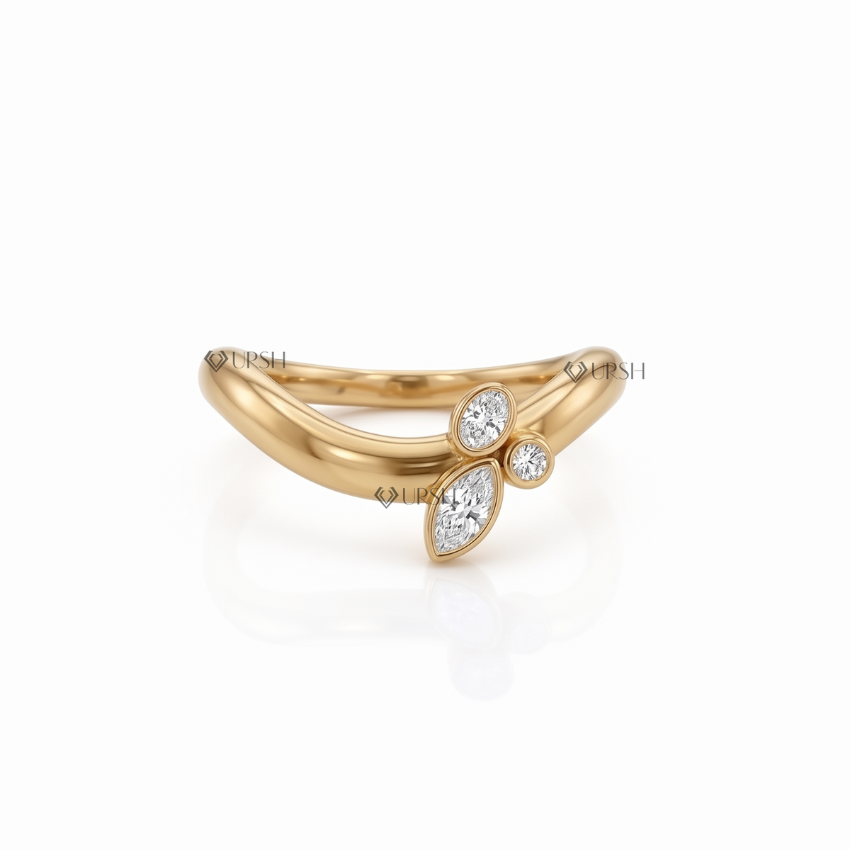 Solid yellow gold bezel-set round, marquise, and pear diamond curved ring featuring an asymmetric cluster on a contoured band