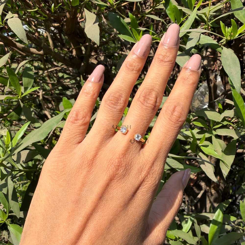 Dainty yellow gold open diamond gap ring showcasing negative space knuckle coverage