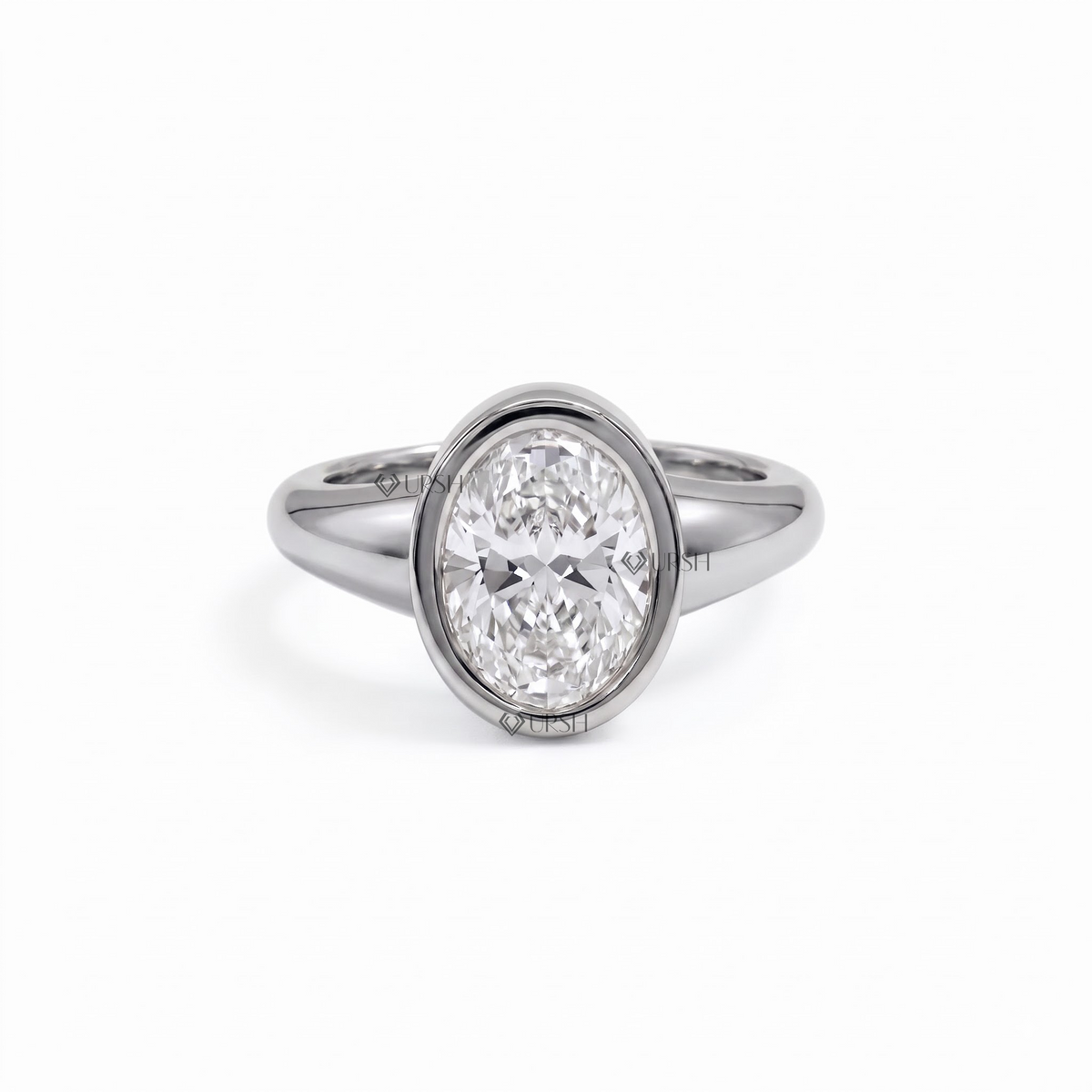 Solid white gold oval bezel-set solitaire engagement ring featuring a sleek flush bezel setting