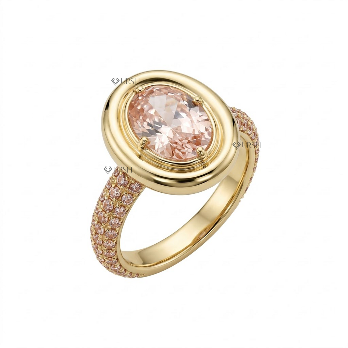 Studio angle of yellow gold oval bezel statement ring displaying raised halo frame and pink pavé shank profile