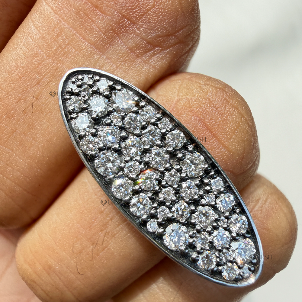 High finger coverage of horizontal oval diamond plate ring worn on finger