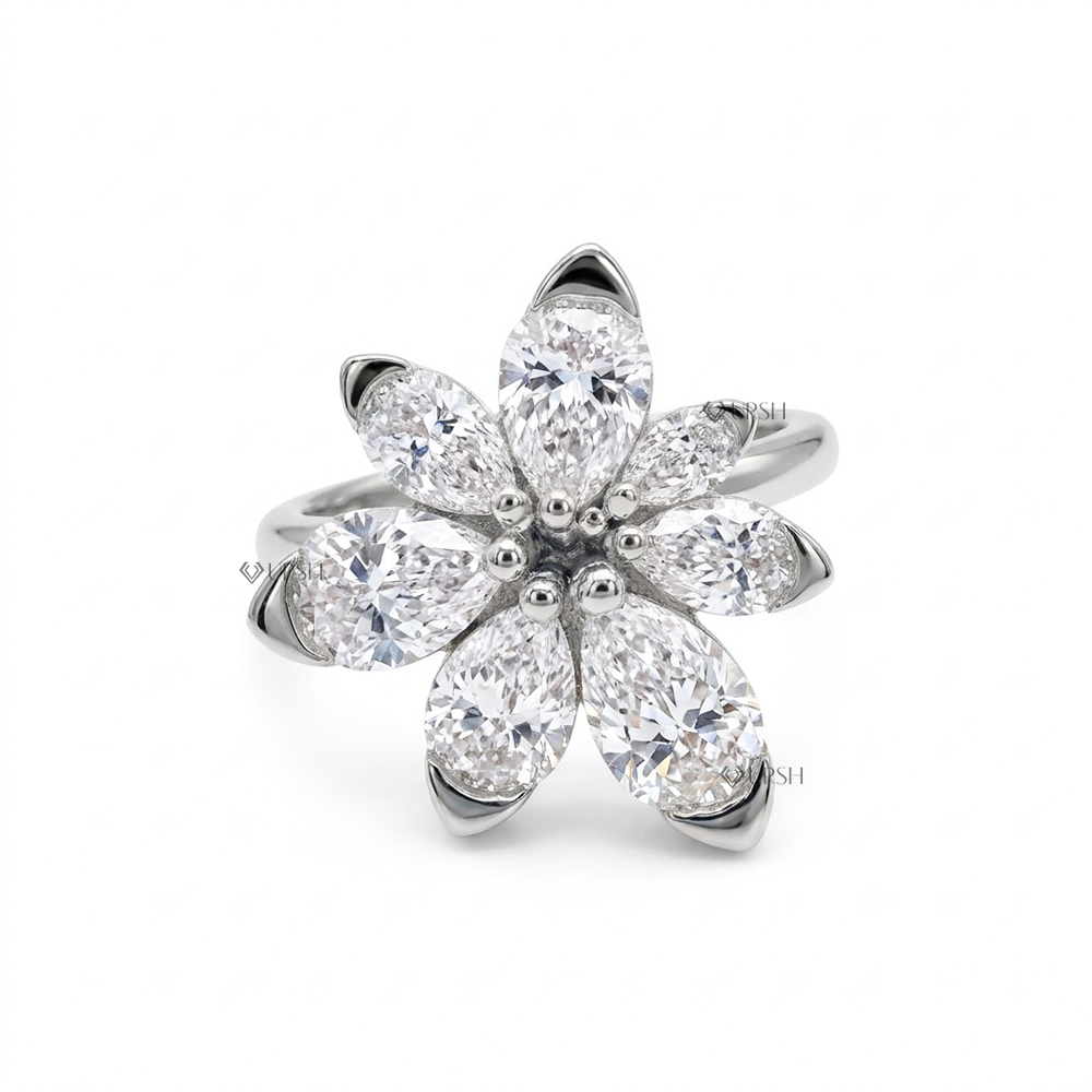 Solid white gold sculptural flower petal ring set with high clarity pear diamonds
