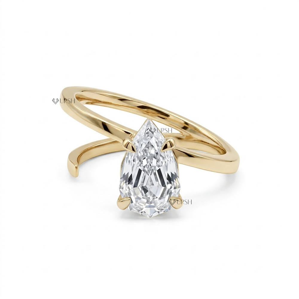 Solid yellow gold modern open coil wrap ring with prong set pear step cut diamond