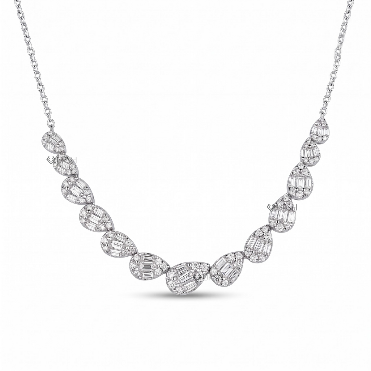 Solid white gold graduated pear cluster diamond station frontage necklace displayed on clean white background