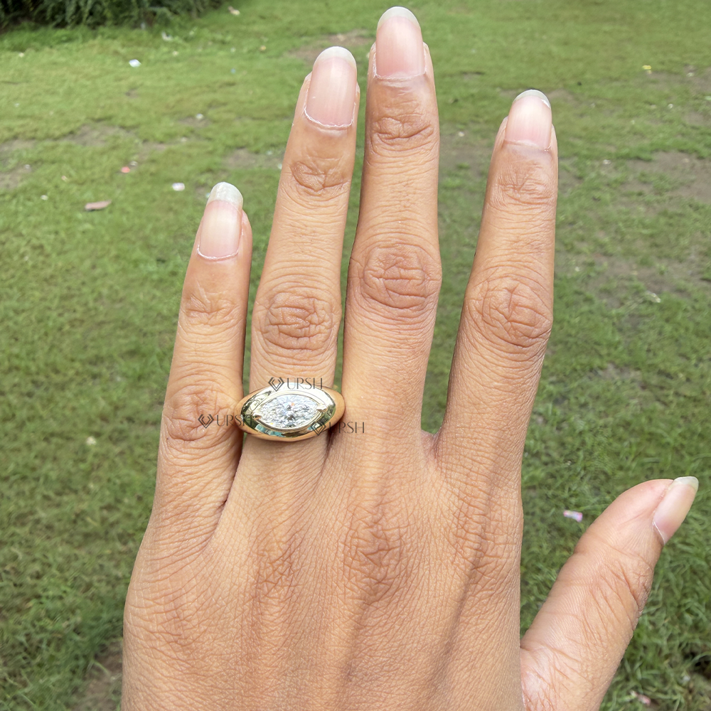 Front hand view wearing modern horizontal marquise cut diamond solid gold statement ring