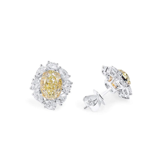 Orecchino con diamante giallo chiaro e bianco da 6,08 ct