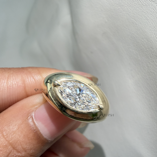 Comfort fit interior and solid gold band thickness of marquise bezel dome ring