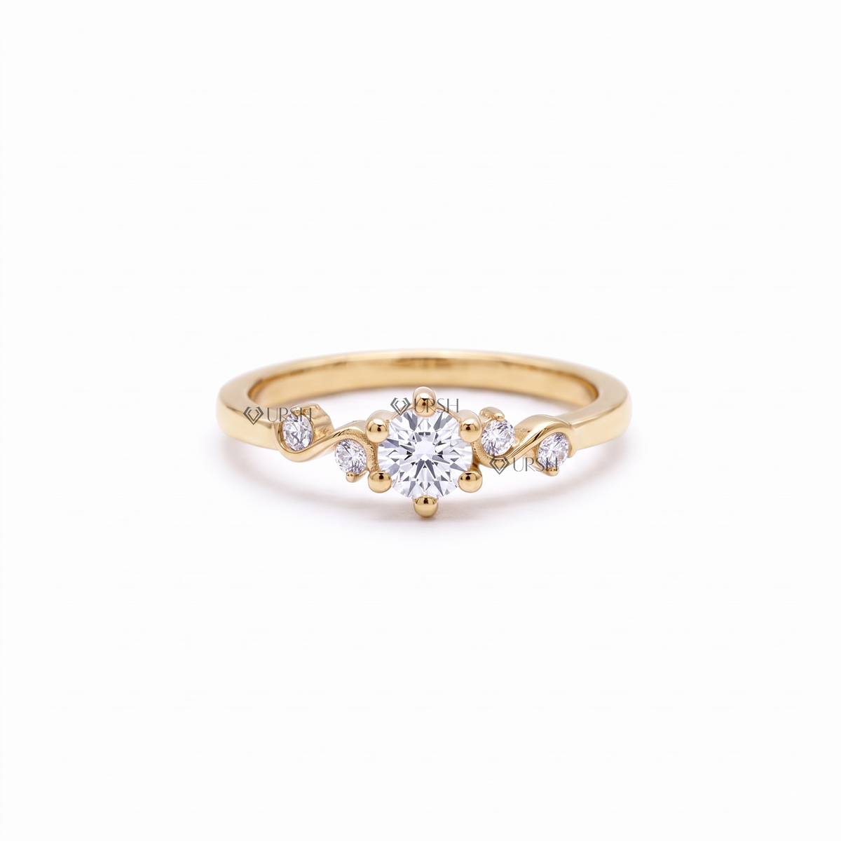Solid yellow gold asymmetrical wave engagement ring featuring a round brilliant center diamond and flowing cluster shoulders