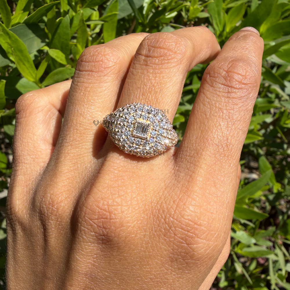 Hexagonal silhouette diamond dome ring catching afternoon sunlight on ring finger