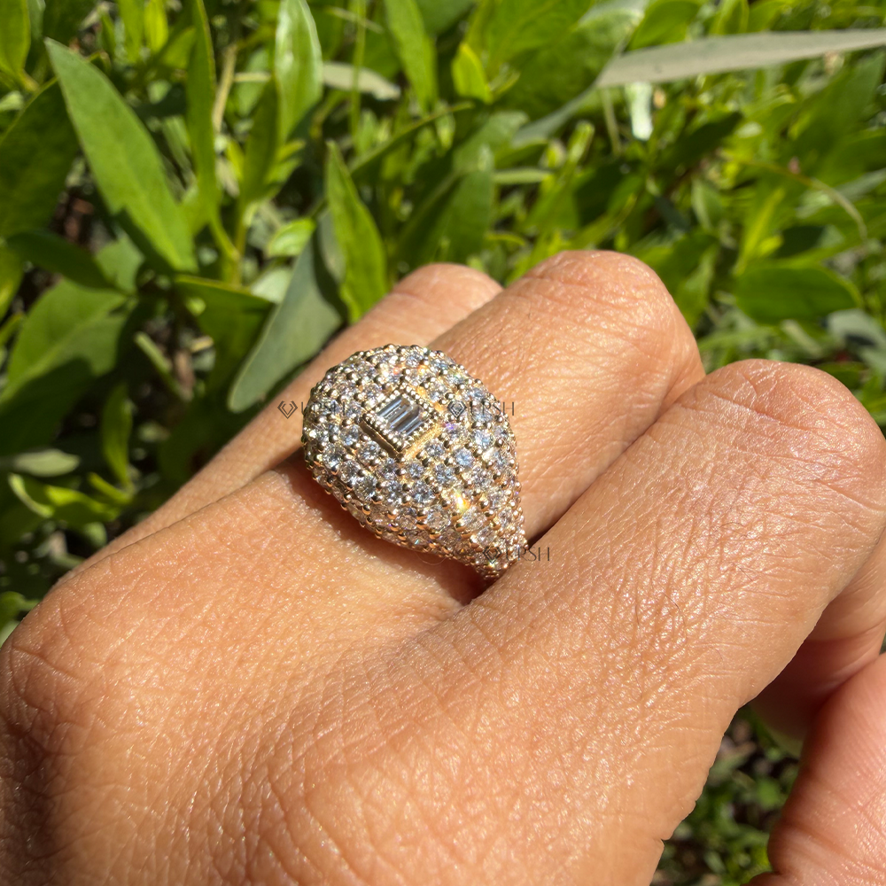 Curved volume and brilliance of yellow gold multi-row diamond dome ring worn on hand
