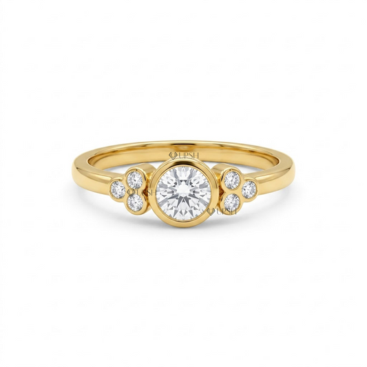 Solid yellow gold bezel-set cluster diamond engagement ring featuring a round brilliant center stone and bezel accent clusters