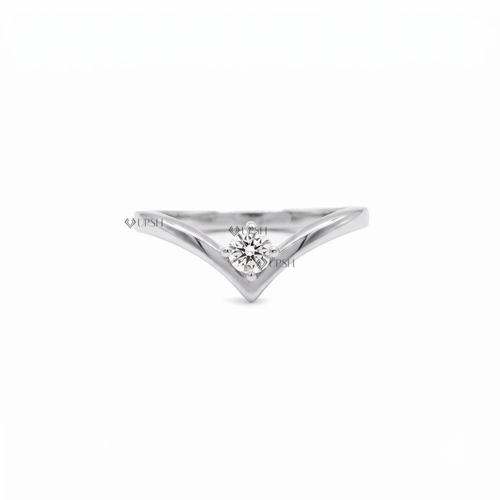 Solid white gold pointed V-shape diamond wedding ring on clean white backdrop
