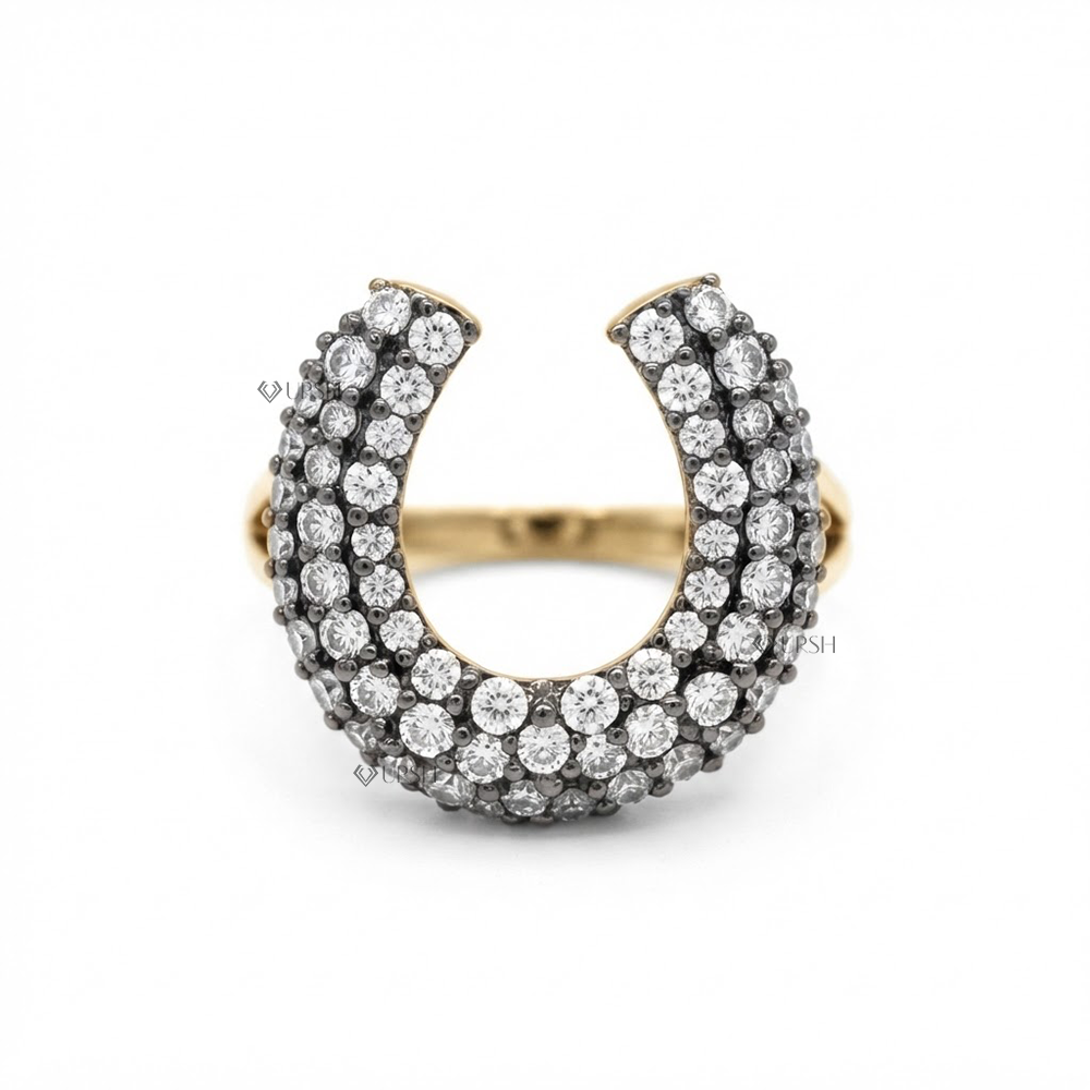 Solid yellow and white gold chunky horseshoe statement ring encrusted in multi-row lab diamond pavé with blackened accents