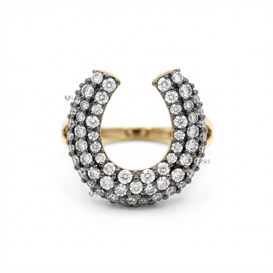 Solid yellow and white gold chunky horseshoe statement ring encrusted in multi-row lab diamond pavé with blackened accents