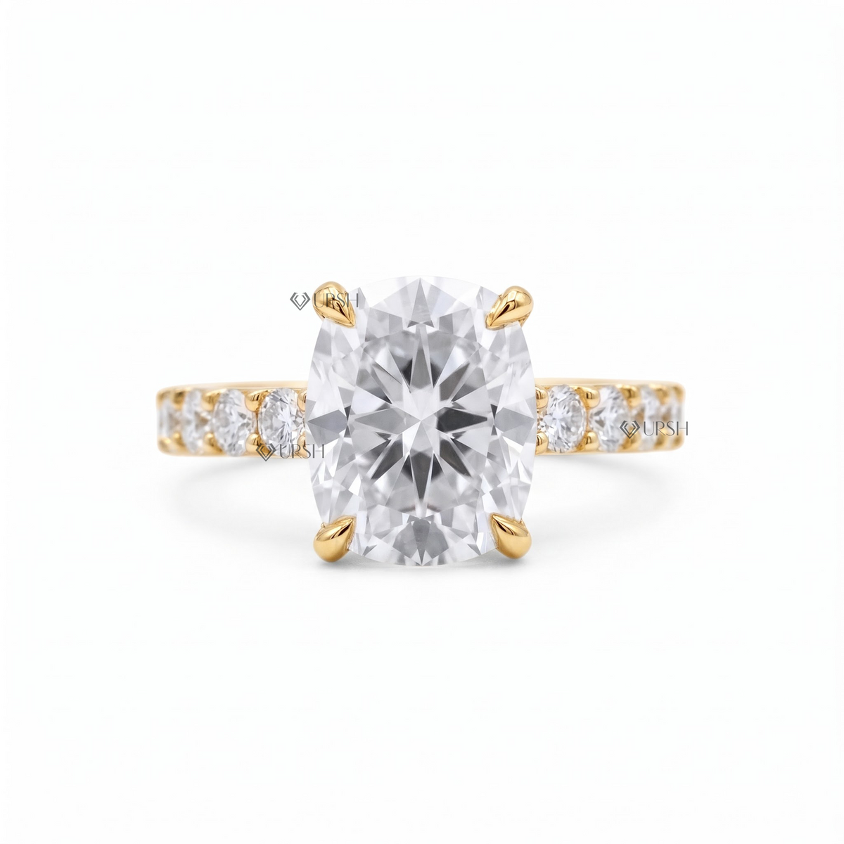 Solid yellow gold cushion cut solitaire engagement ring featuring an elongated center diamond on a prong-set band