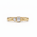 Modern Bezel-Set Emerald and Oval Diamond Toi Et Moi Ring