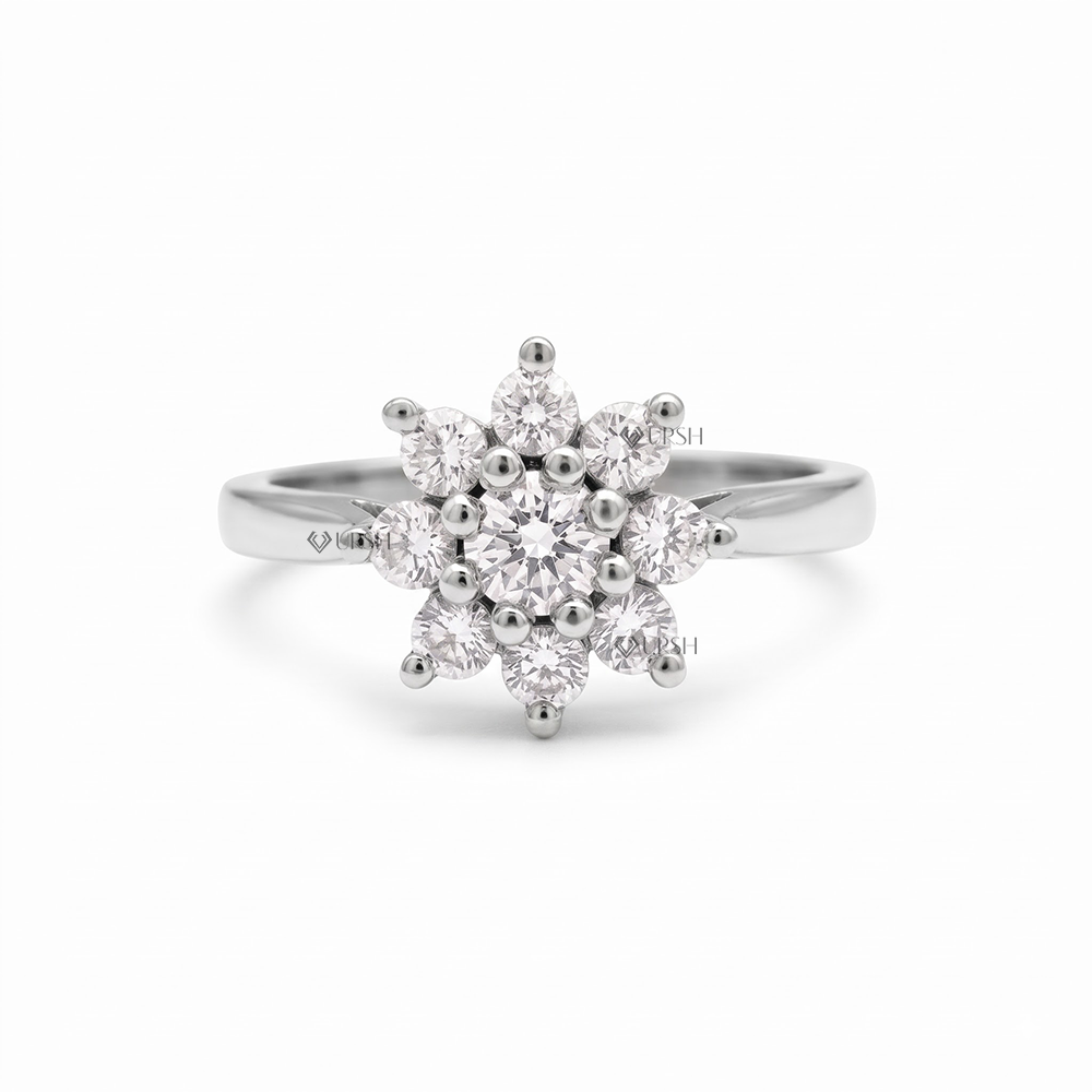 Solid white gold snowflake starburst diamond cluster ring on clean white backdrop
