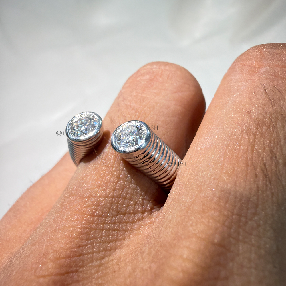 Angled view of white gold fluted open diamond ring showing ribbed exterior texture