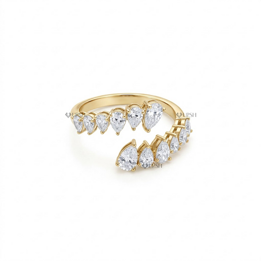 Solid yellow gold two row graduated pear lab diamond bypass ring on white background