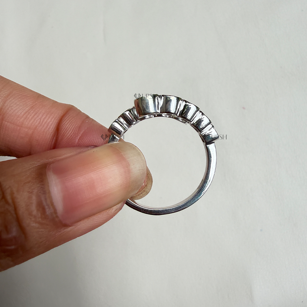 Under-finger view displaying solid gold comfort-fit bypass band and open interior structure