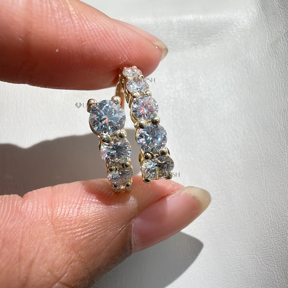 Holding two-tone bypass wrap ring showcasing prong-set stone profiles and dual-row structure