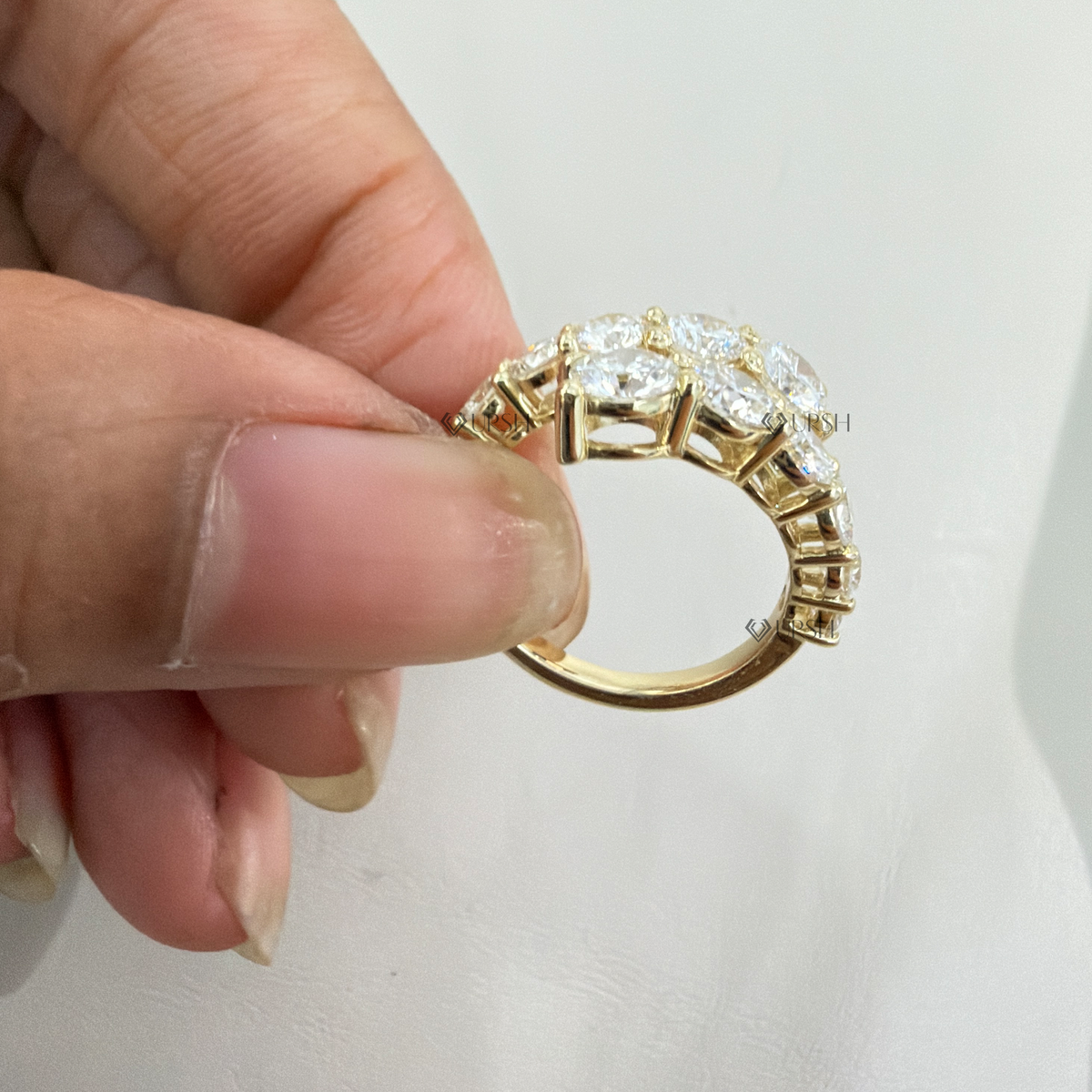 Under-finger view displaying solid gold comfort-fit bypass band and open interior structure