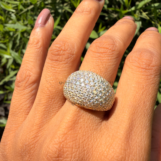Yellow gold full pavé diamond dome cocktail ring styled across index finger