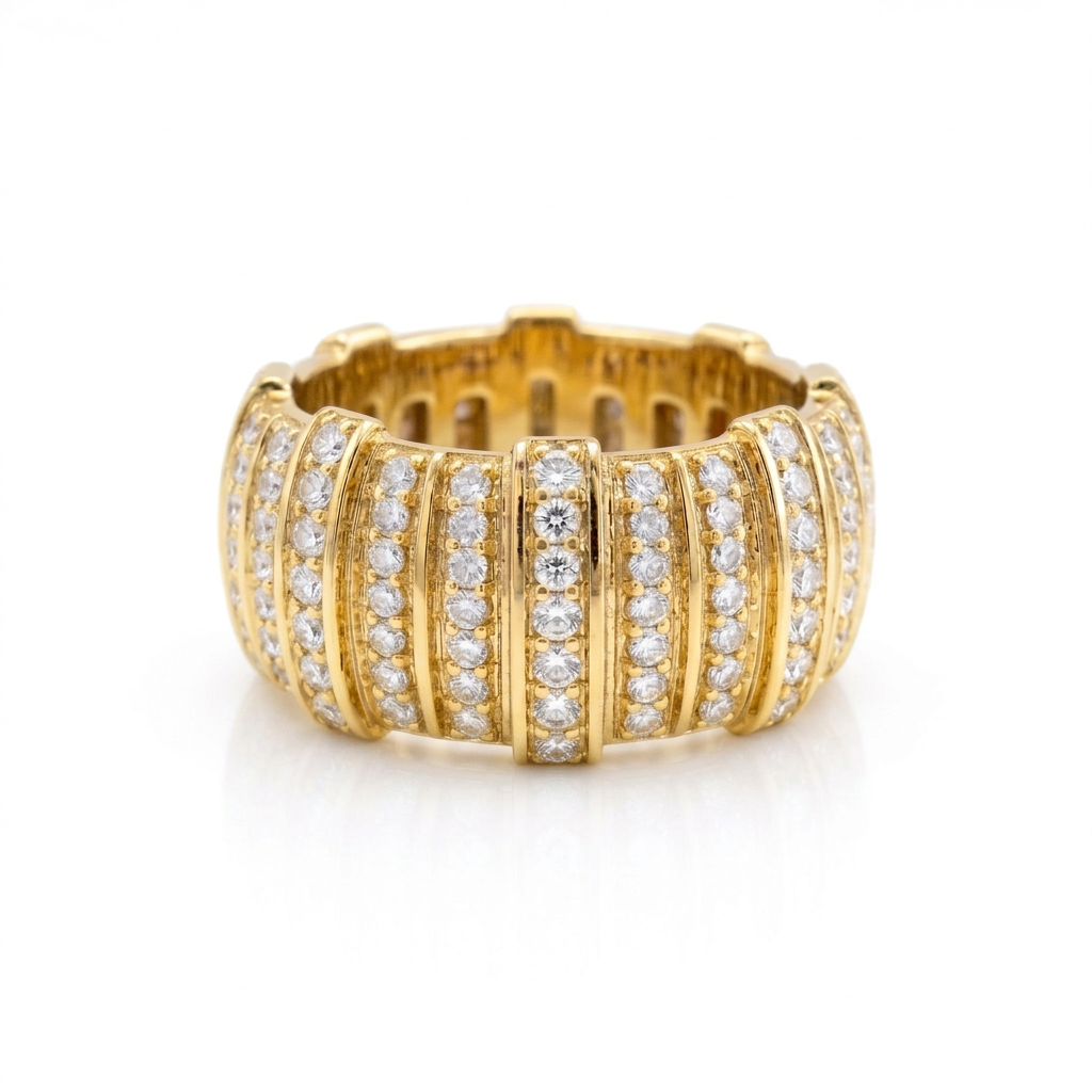 Solid yellow gold wide multi-row pavé barrel statement ring featuring vertical diamond tracks separated by polished rails