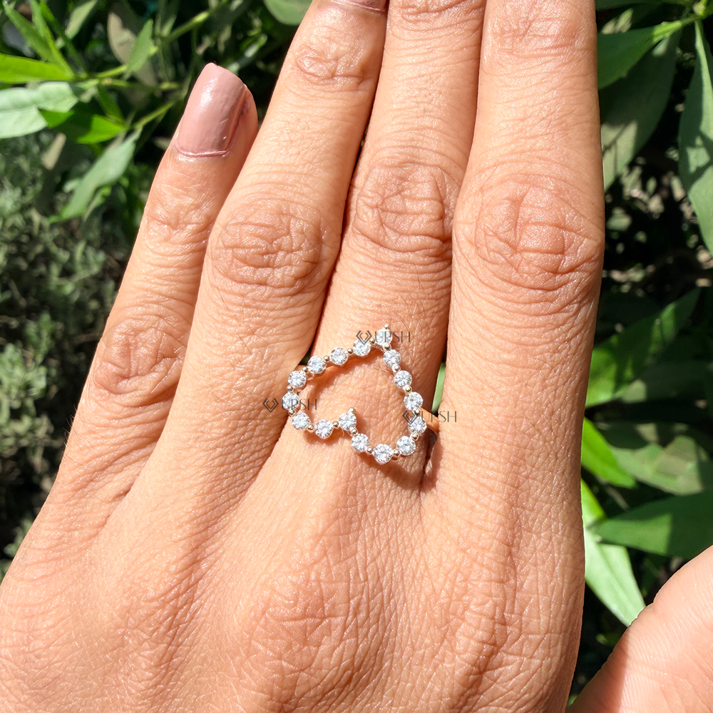 Delicate open heart diamond knuckle band showcasing finger coverage on ring finger