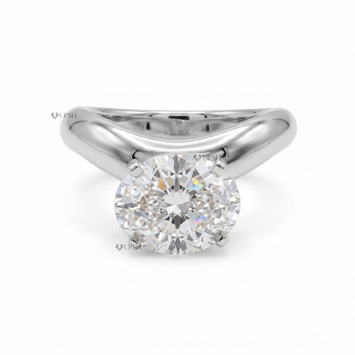 A classic solitaire engagement ring featuring a round brilliant-cut diamond set in a polished white gold or platinum band, shown on a clean white background with a faint watermark.