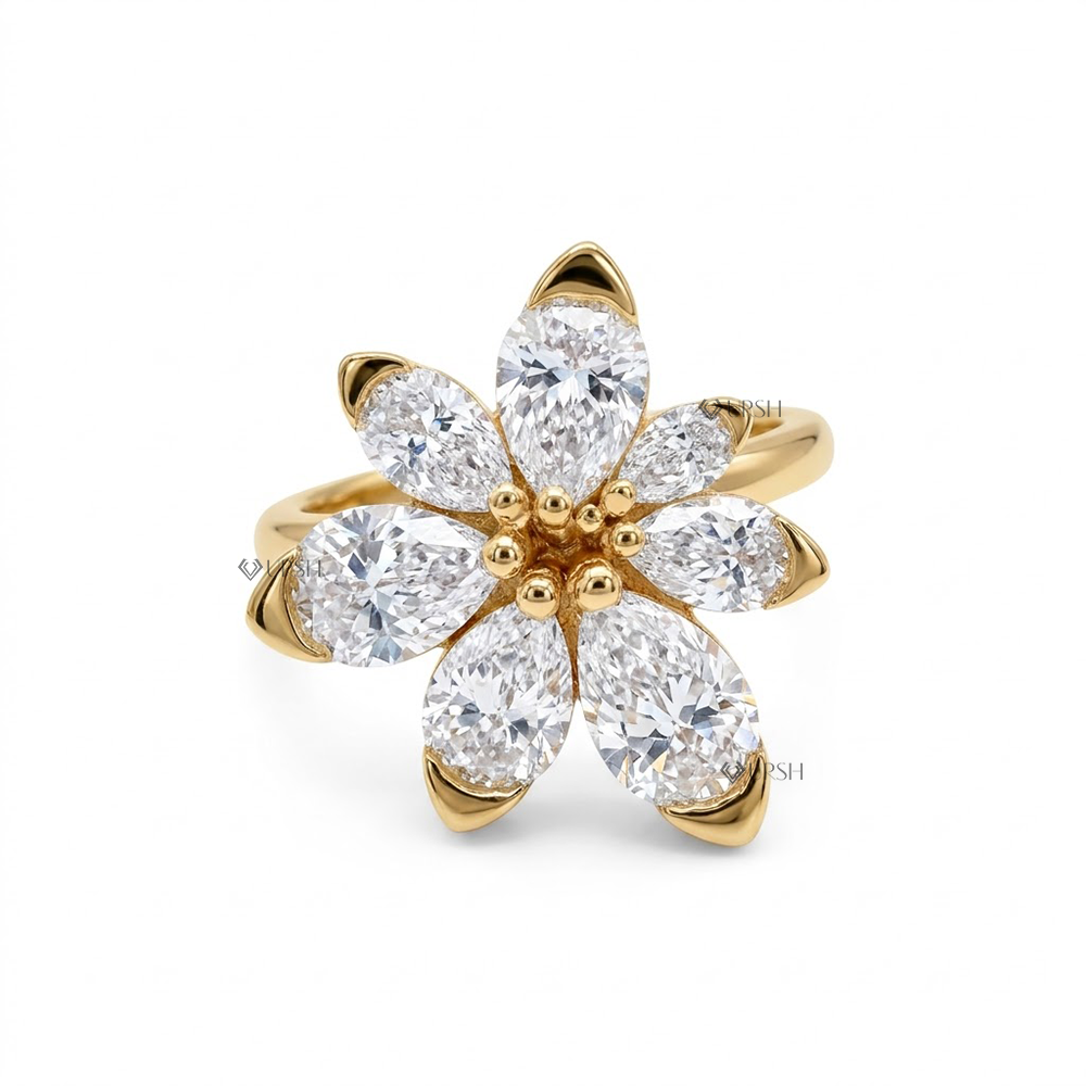 Solid yellow gold botanical flower ring featuring brilliant pear cut lab diamonds