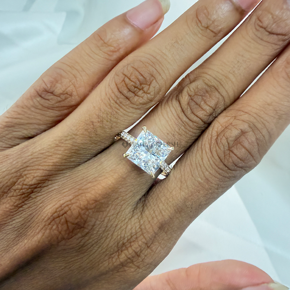 Radiant cut diamond engagement ring styled gracefully on ring finger