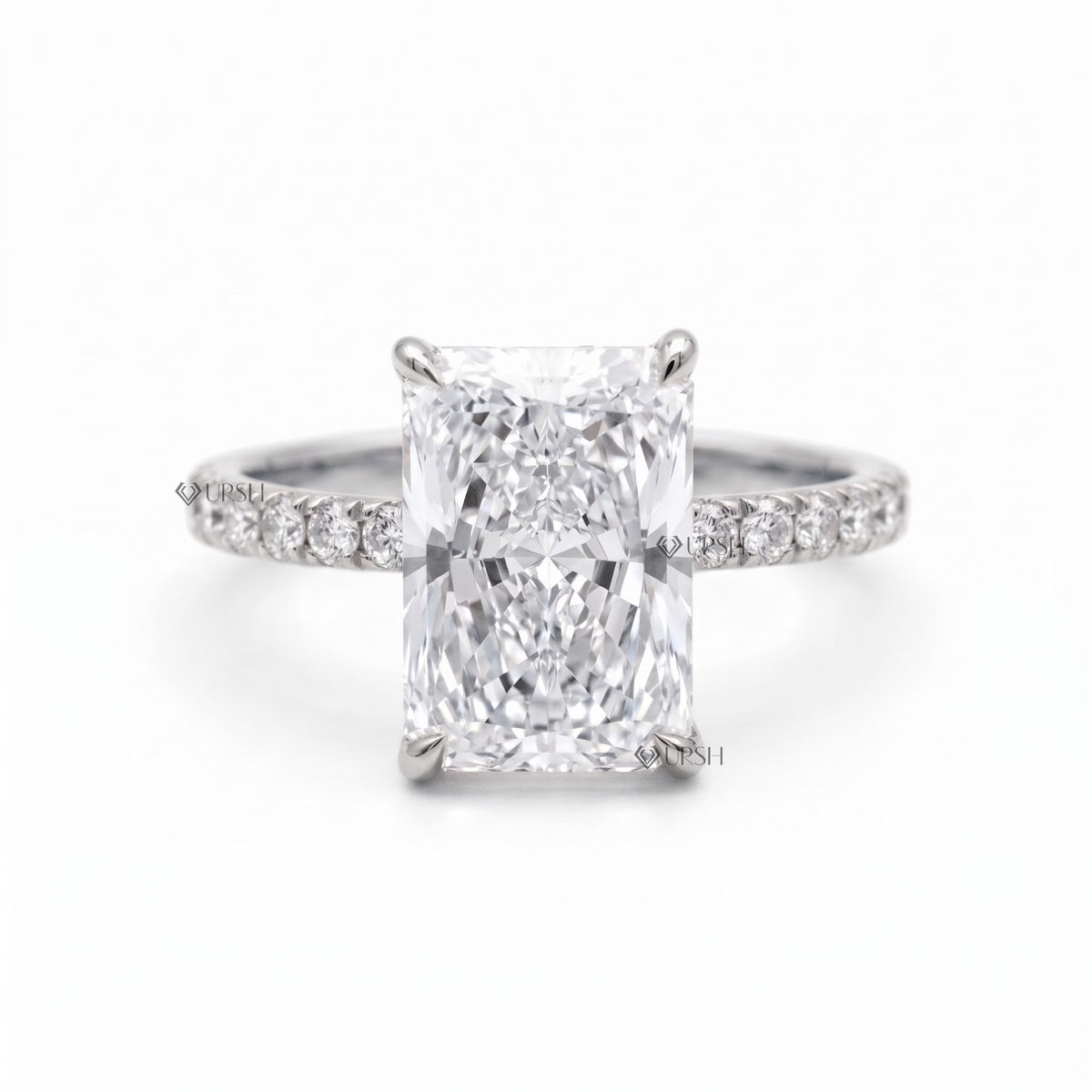 Solid white gold radiant cut solitaire ring with micro-pavé shank on clean white background