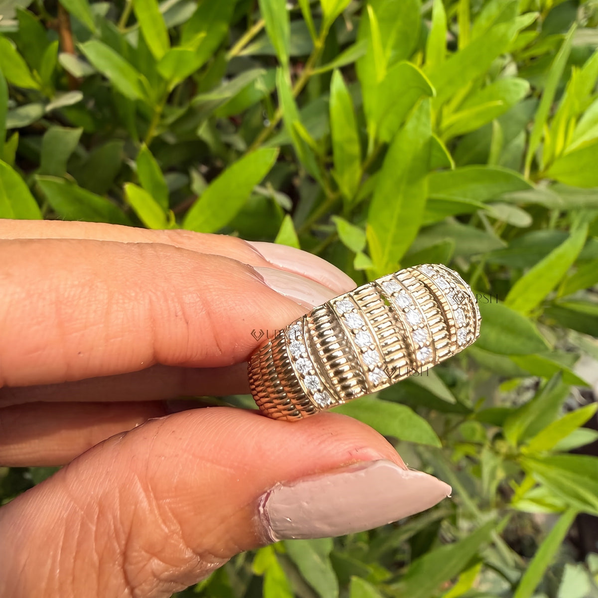 Striking grooved statement ring worn on hand showcasing chunky architectural proportions