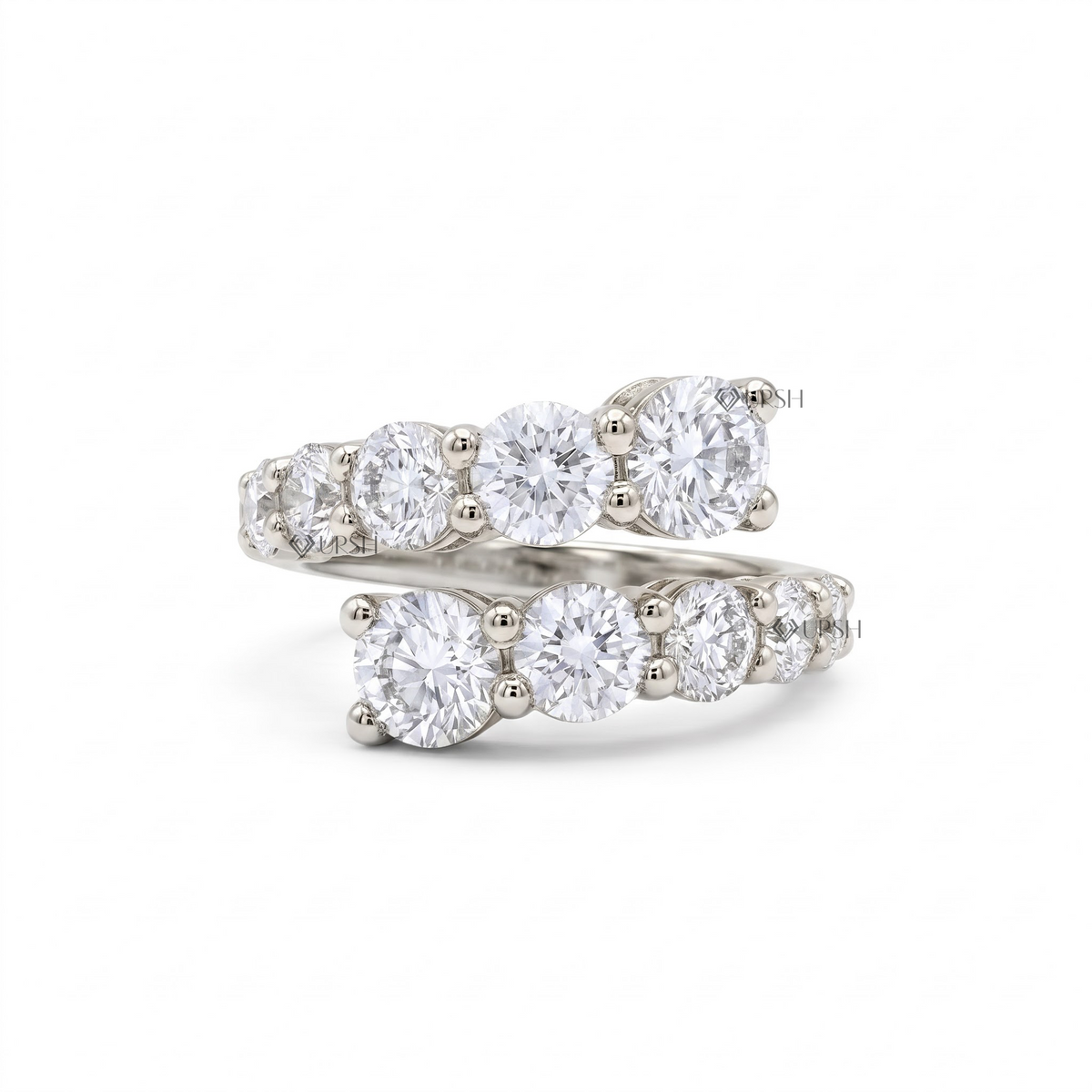 Solid white gold multi-stone prong-set bypass statement band on clean white background