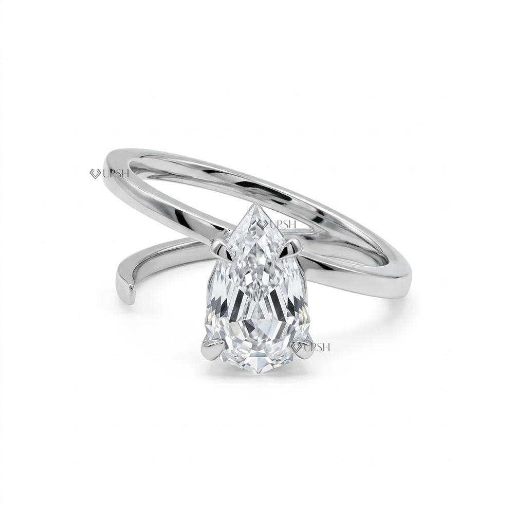 Solid white gold spiral bypass solitaire ring featuring step cut pear lab grown diamond