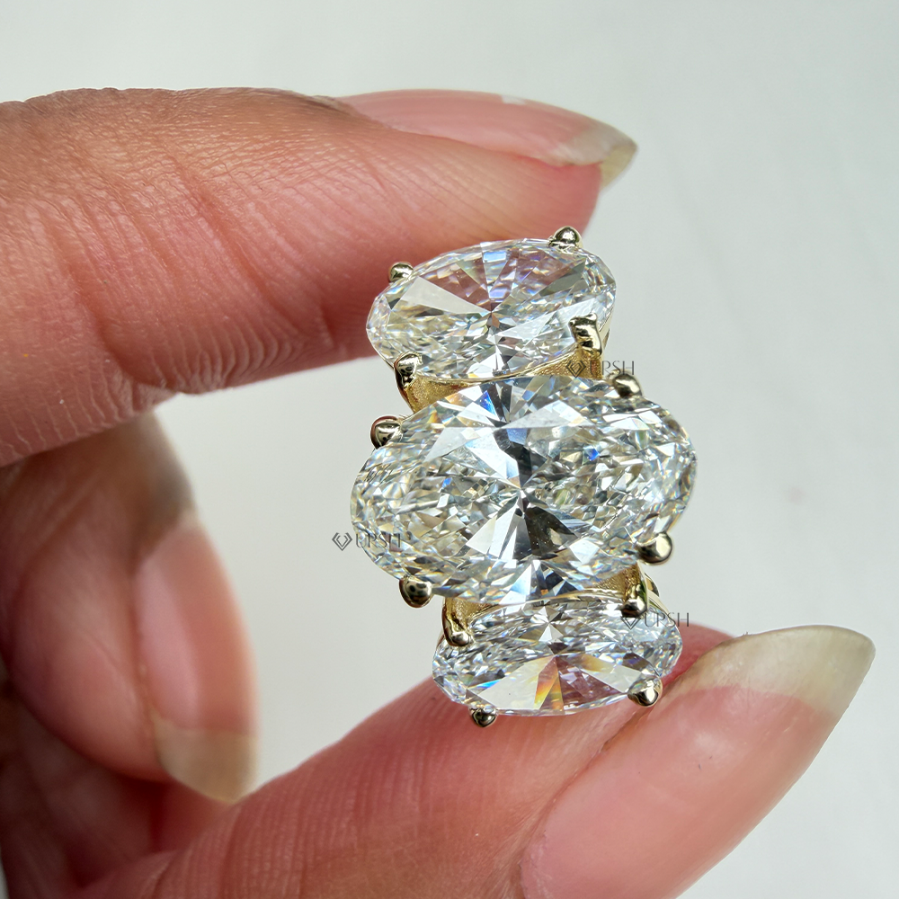 Under-finger view displaying solid gold comfort-fit band and sturdy gallery bridge