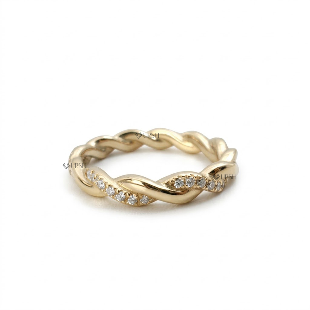 Solid yellow gold twisted rope pavé diamond band featuring an intertwined infinity design