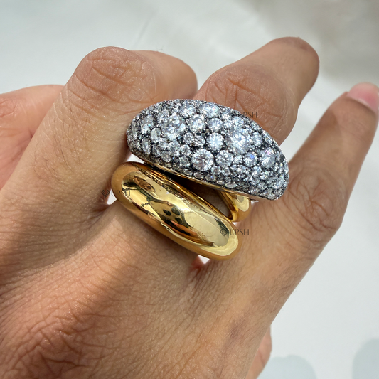 Sculptural two-tone diamond dome cocktail ring worn on hand showing substantial knuckle presence