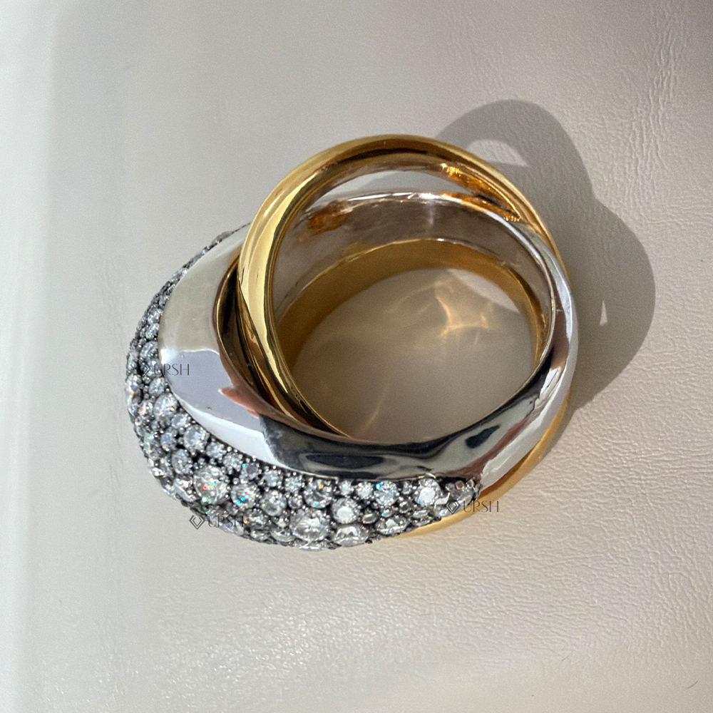 Top-down view displaying interlocking rolling band silhouette and blackened diamond pave accents