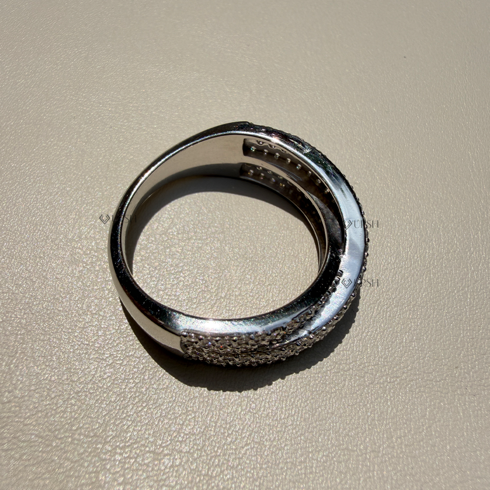 Under-finger view displaying solid gold comfort-fit inner shank and smooth crossover backing
